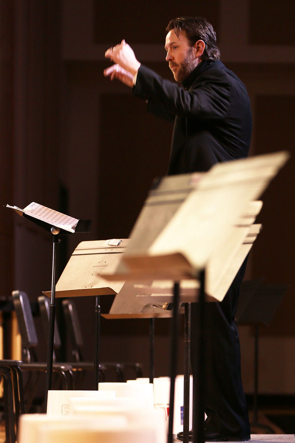 Buffalo High School band director Jason Bennett leads the percussion ensemble